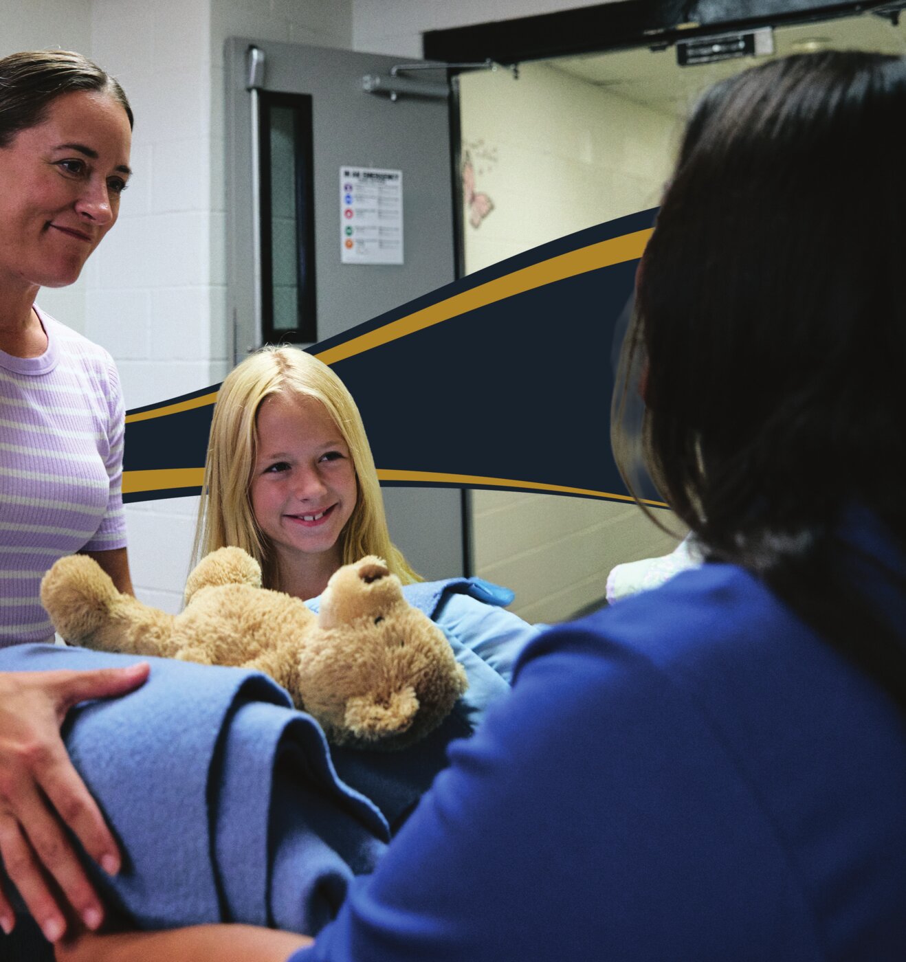 A mother and daughter receive support and a comfort item from a Salvation Army volunteer